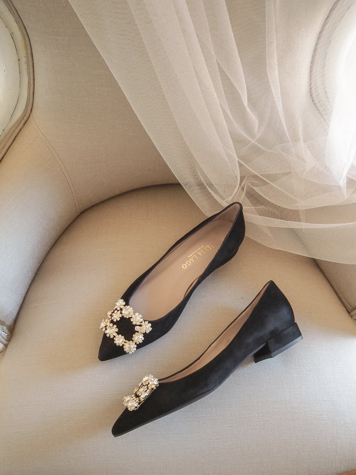 Audrey black flats.