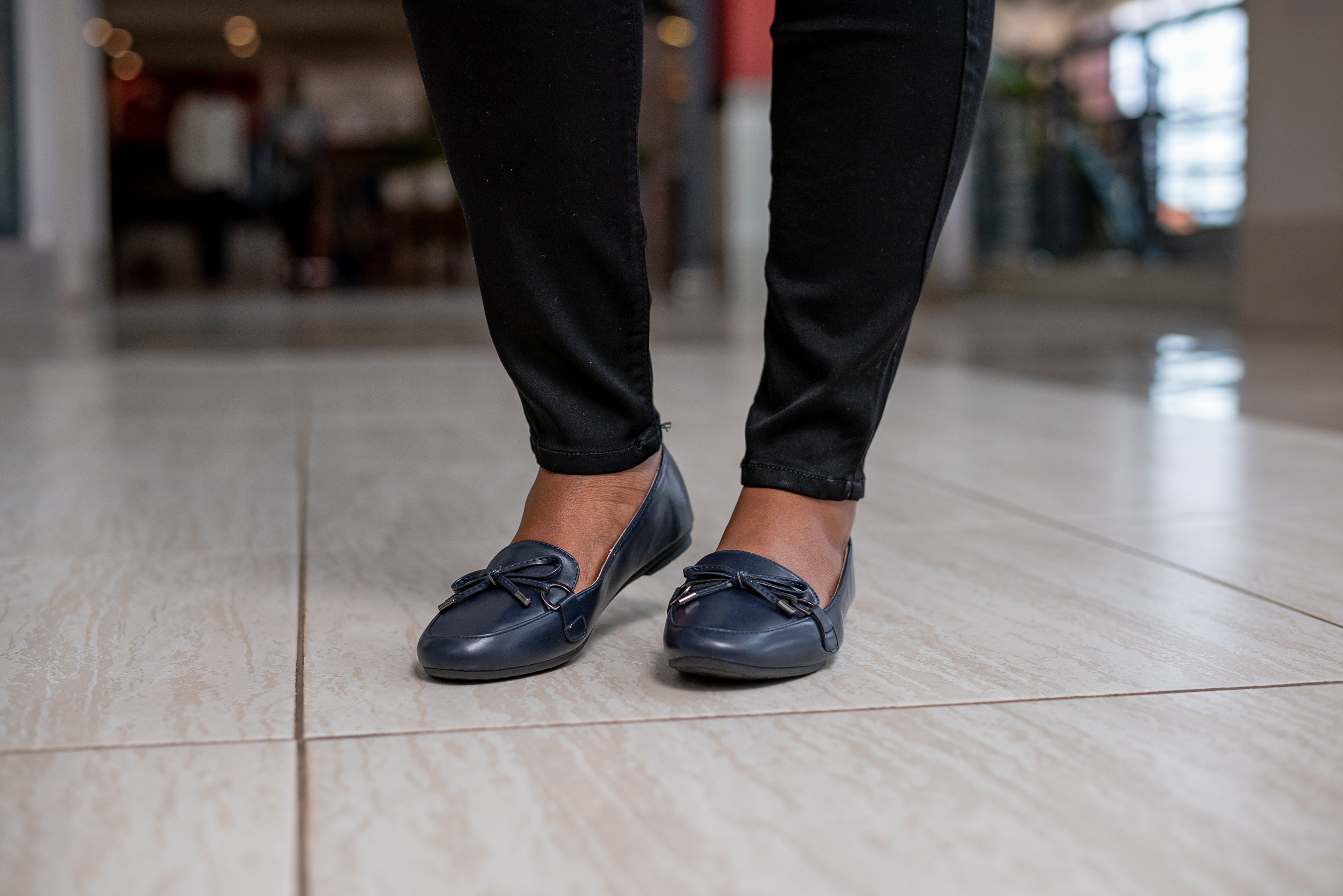 Blue flat shoes.