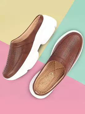 brown laser cut mule shoes for women, open back slip-on design with stitched details.