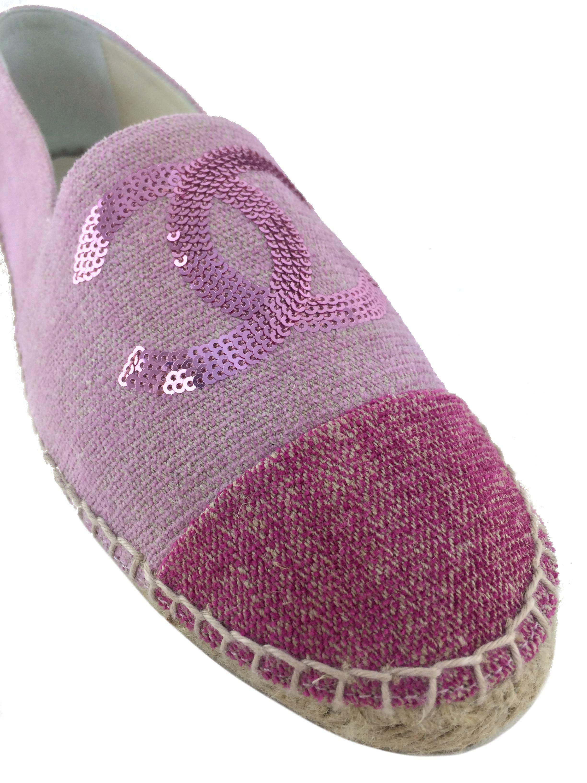 Chanel espadrilles in size 10, made with canvas and adorned with sequins featuring the CC logo.