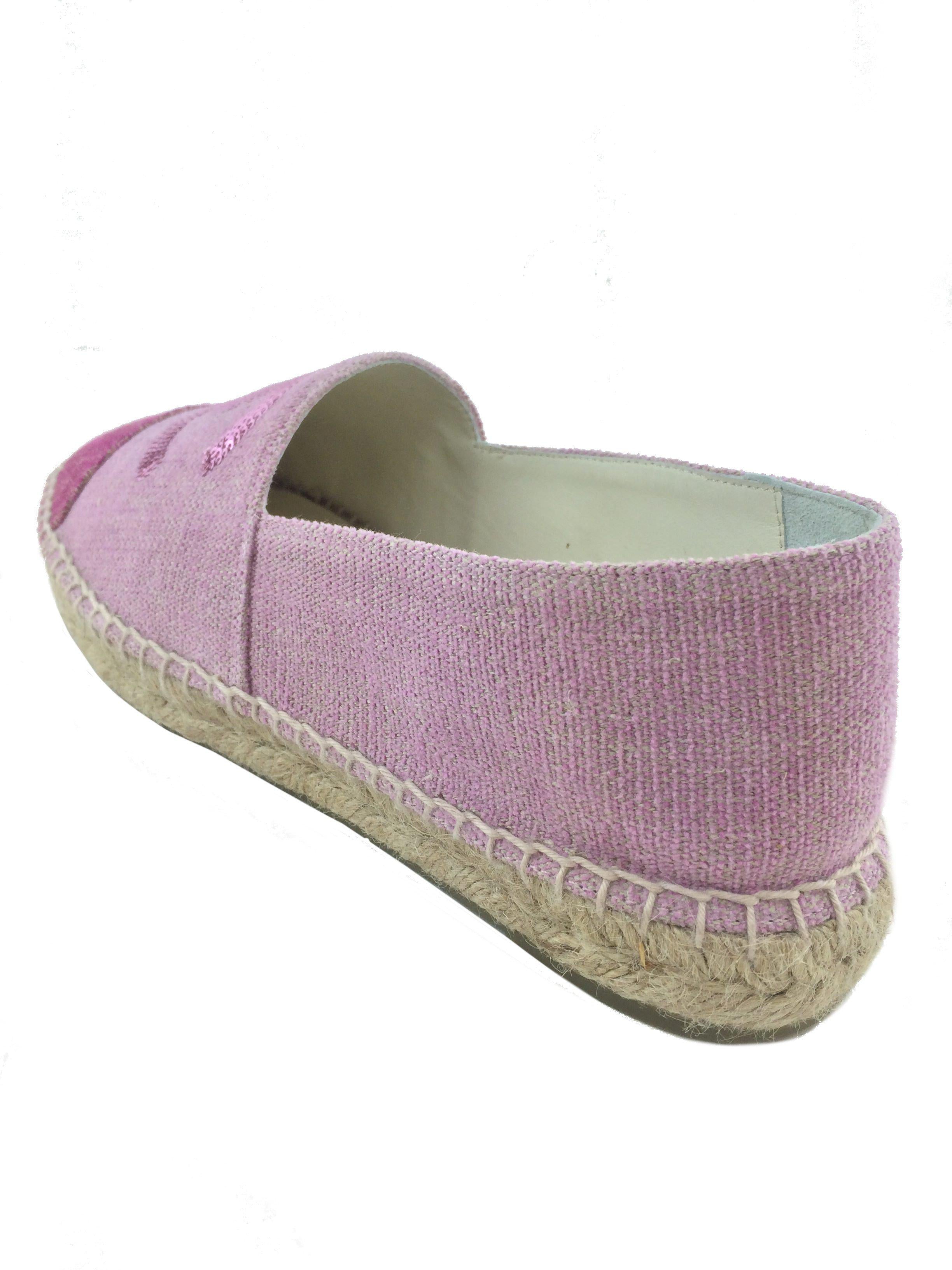 Chanel espadrilles in size 10, made with canvas and adorned with sequins featuring the CC logo.