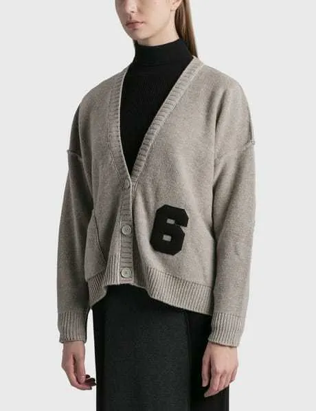 MM6 Maison Margiela cardigan with medium logo in wool for casual style.