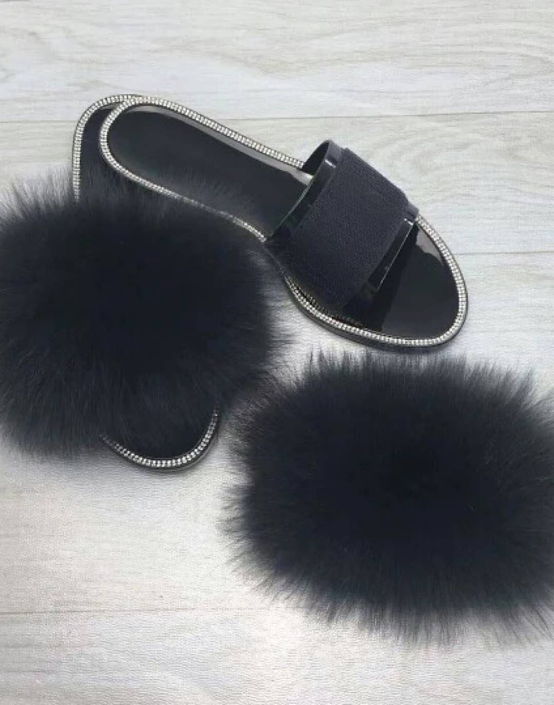 Natural fur slide sandals adorned with rhinestones