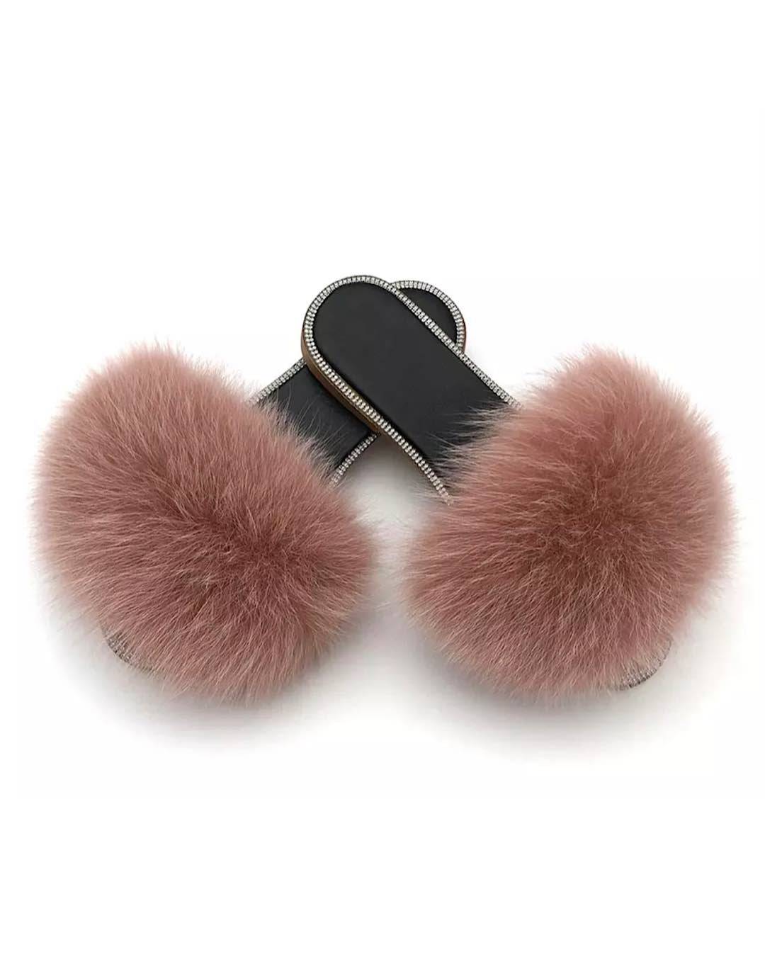 Natural fur slide sandals adorned with rhinestones