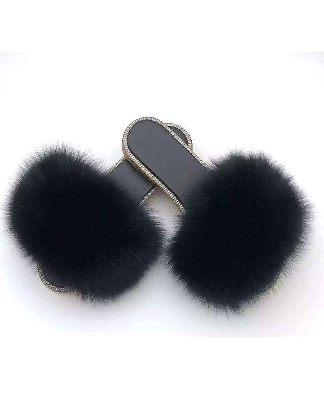 Natural fur slide sandals adorned with rhinestones