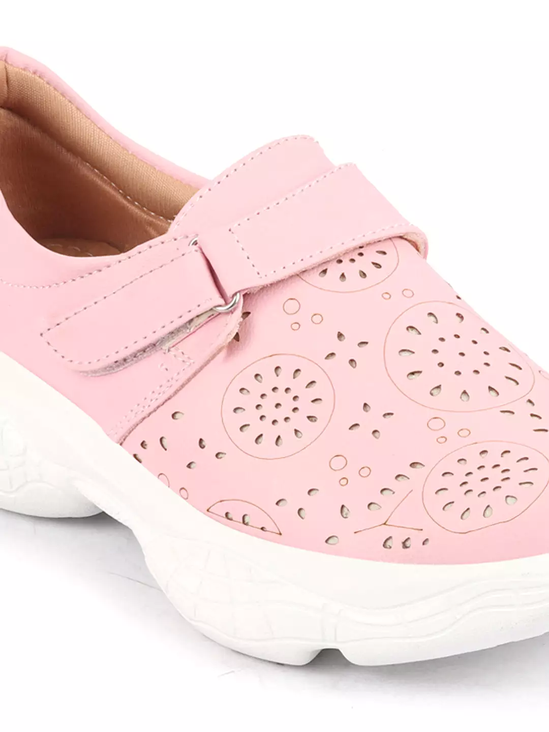 Pink laser-cut design open back shoes with stitched detail and hook & loop buckle for women.