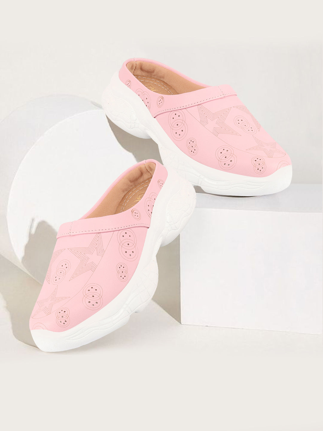 Pink laser cut star open back slip-on mules shoes for women.