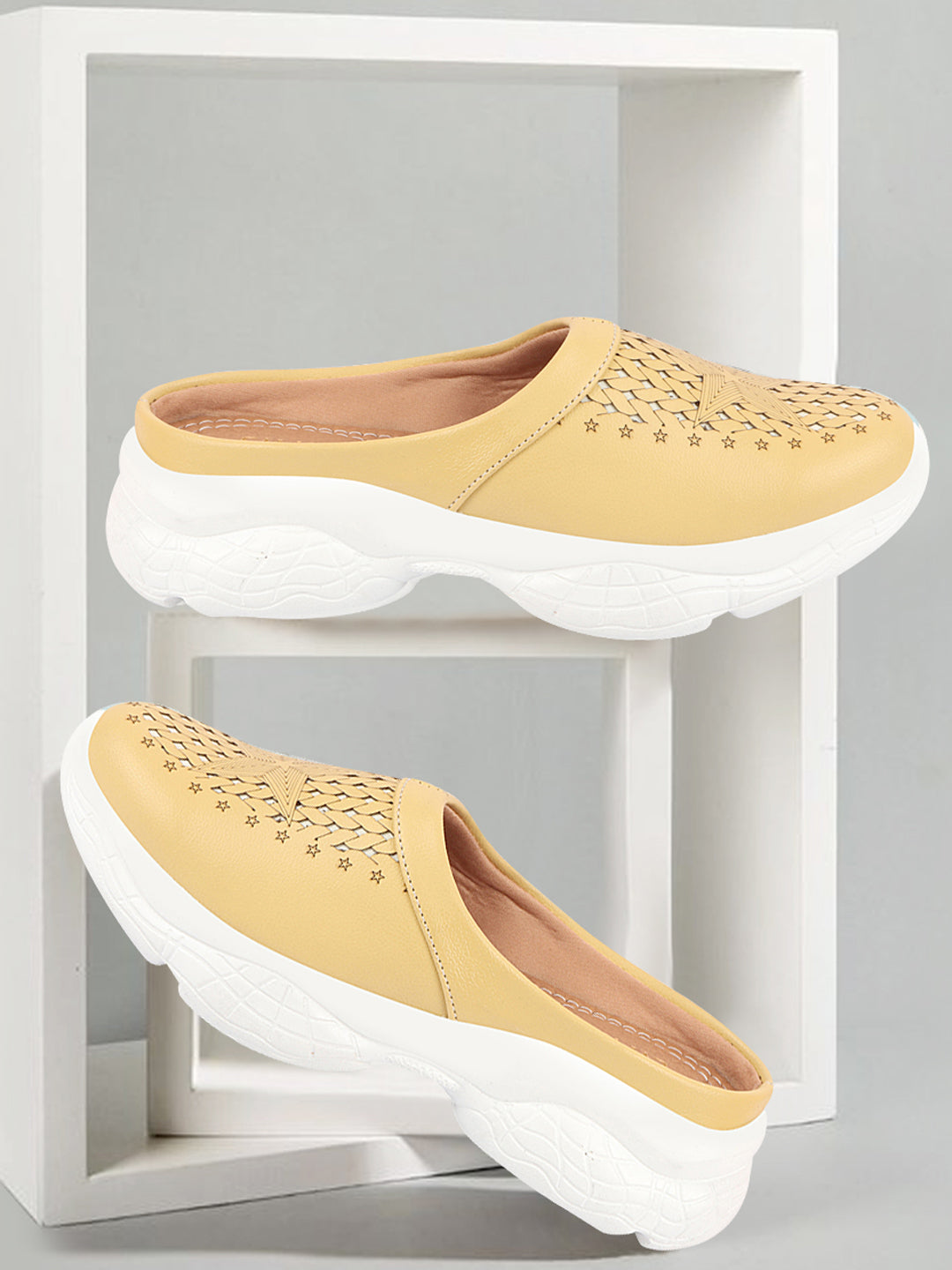 Women's Yellow Laser Cut Slip-On Mules Shoes with Stitched Back.